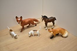A Beswick pottery fox study, model 1016a designed by Arthur Gredington in red/brown and white