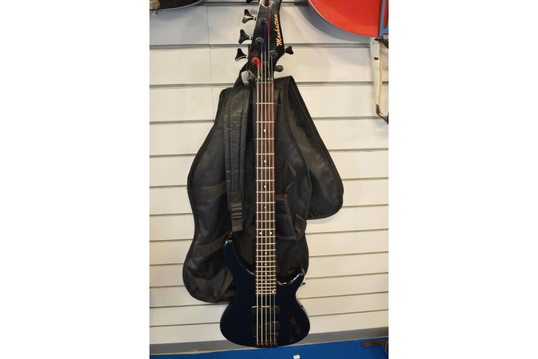 A 5 string electric bass guitar, headstock stamped Manhattan, with soft gig bag