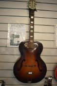 A 1930s Columbian Prefect (apparently made by Harmony) archtop acoustic guitar having perloid