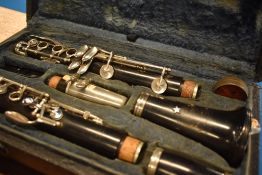 A Boosey and Hawkes student clarinet in vintage Clifford Essex & Sons case