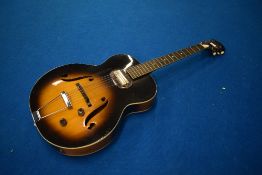A vintage Harmony H51 archtop hollowbody electric guitar with Gibson P-13 pick up, part of the