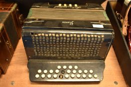 A vintage Schlossinetrel button accordion , sold with later accordion case (German)
