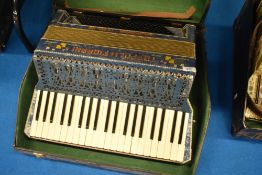 A vintage Toffoli & Fiorani Piano accordion, with case