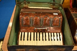 A vintage Victoria Castelfidardo piano accordion , in case