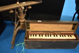 A late 19th/early 20th century mahogany cased Harmonina portable organ by Debain of Paris, with