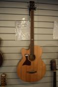 A Tanglewood TW155A acoustic bass guitar (left handed) , as new , part of the Olly Alcock