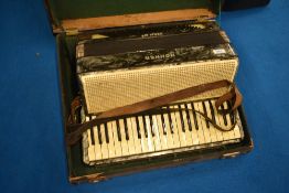 A vintage Hohner Verdi III B piano accordion , in case