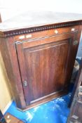 A 19th Century oak corner cupboard