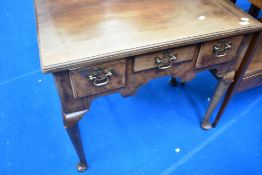 A Queen Anne style kneehole desk, W77 D47 H68cm