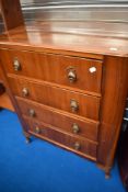 A mid 20th Century walnut bedroom chest and an open back bookshelf