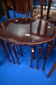 A period style nest of three tables