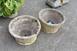 Two concrete garden planters, basket form