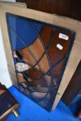 A leaded and stained glass panel