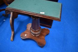 A 19th Century rosewood table base having later green beize top of small proportions