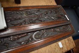 Two pieces of carved oak panelling , each approx. 72 x 15cm