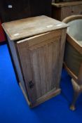 A Victorian stripped pot cupboard in the Aesthetic style