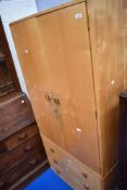 A vintage satin style sapele wardrobe, having three drawers to base, approx dimensions W81 H178cm