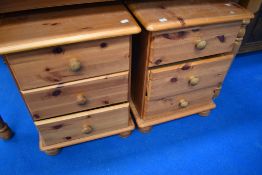 A pair of vintage pine bedside chests