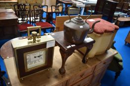 A small woven fibre ottoman, stained frame stool or occasional table, oversized mantel clock and