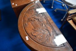 An Oriental style half moon side table