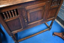 A traditional oak food cupboard on style frame, width approx 91cm