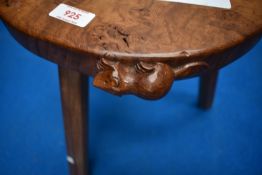 An Arts and Crafts three legged stool, having 'Beaverman' (Colin Almack, ex Mouseman) width