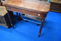 A 19th Century mahogany fold over tea table, width approx. 84cm