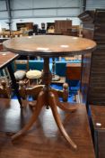 A reproduction Regency style oval coffee table, approx 53 x 39cm