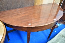 A 19th Century mahogany demi lune table on square tapered legs with extending flap, width approx.