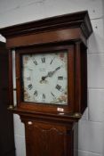 An 18th century oak long cased clock having 30 hour movement, painted dial and single hand only,