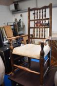 A 19th Century spindle back carver chair