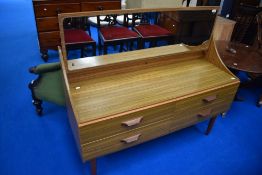 A vintage laminate dressing table of stylised design, width approx. 124cm