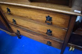An early 20th Century two drawer oak bedroom chest