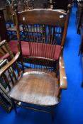 A 19th Century oak spindle back carver chair