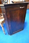 A 19th Century oak corner cabinet, height approx. 108cm