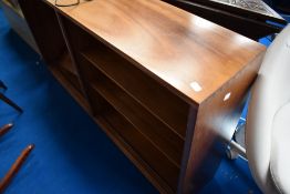 A vintage sapele low bookcase, approx. width 136cm