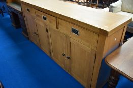 A modern oak sideboard of large proportions, approx. dimensions W200 H100 D45cm