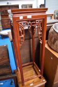 An Oriental hardwood plant stand