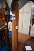A vintage stained frame standard lamp having circular base and fluted column