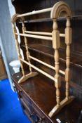 A vintage beech towel rail