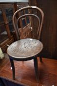 A traditional childrens bentwood chair
