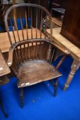 A traditional 19th Century stick back Windsor armchair