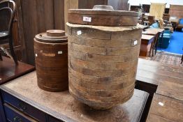 Two wooden containers, possibly food or drink related