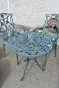 A modern metal garden set comprising table and two chairs