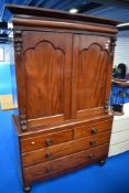 A 19th Century mahogany linen press having two over three drawer base, width approx. 125cm