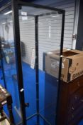 A modern metal and glass four sided display cabinet, height approx 180cm