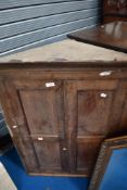 A 19th Century oak corner cupboard
