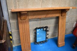 Workshop of Robert 'Mouseman' Thompson, Kilburn, North Yorkshire, an Arts & Crafts golden oak fire