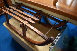 A vintage toboggan/sledge , impressed mark Davos
