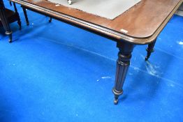 A Victorian style mahogany banquetting table in the Gillows style